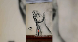 Özbek sokak ressamı duvara çizdiği resimle depremzedelerin acısını paylaştı