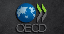 OECD, küresel ekonomik büyüme tahminini yüzde 2,6’ya yükseltti